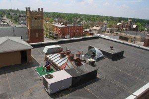 Mike Zucker enjoys the view from atop his four-story building on South Main Street Photo: James Miller/The Marion Star Source: www.marionstar.com
